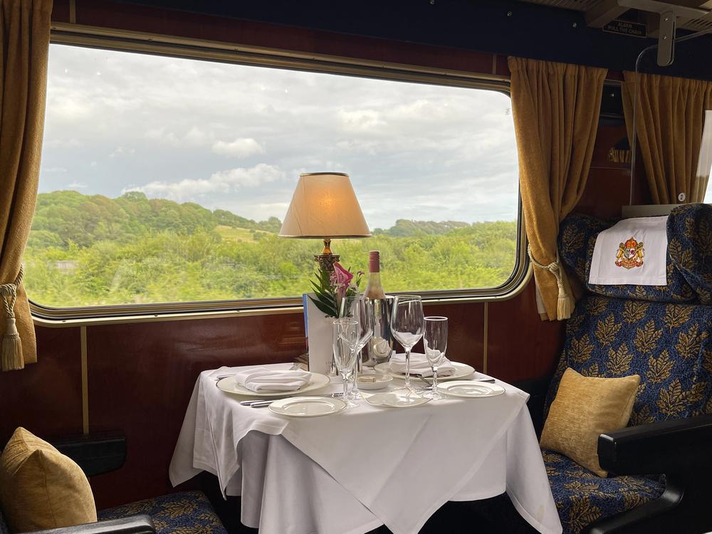 Poole, Dorset, England - July 2021: Formal table setting for dinner in a luxury train operated by Statesman Rail, a charter rail company. — Photo by CeriBreeze