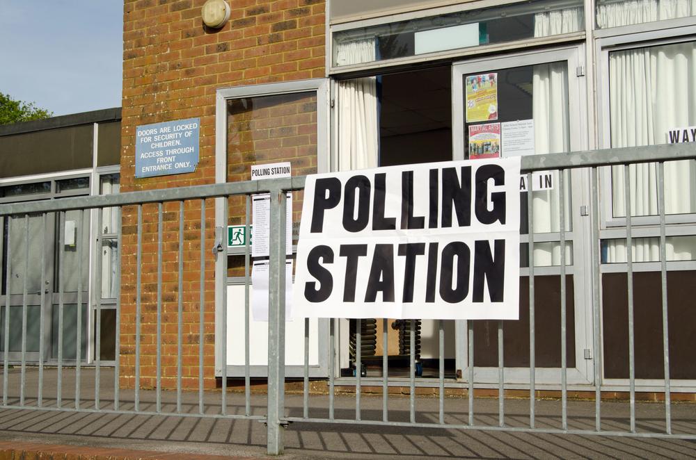 BASINGSTOKE, UK - MAY 5, 2016: Entrance to a polling station at a primary school in Basingstoke, Hampshire on election day. — Photo by BasPhoto
